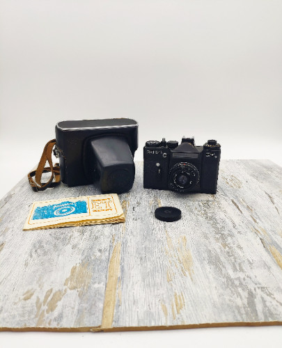 Film camera zenit lens - film, lens-